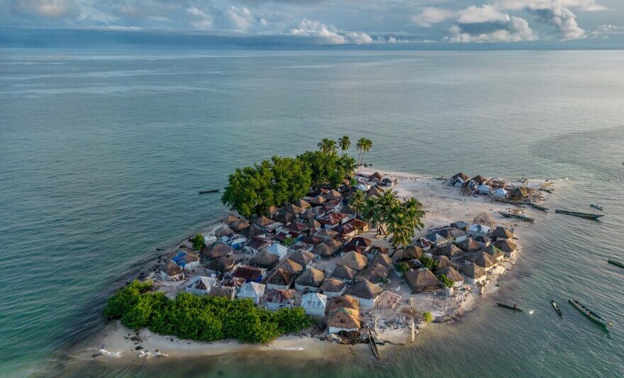 Remote island surrounded by ocean illustrating water scarcity and desalination dependency